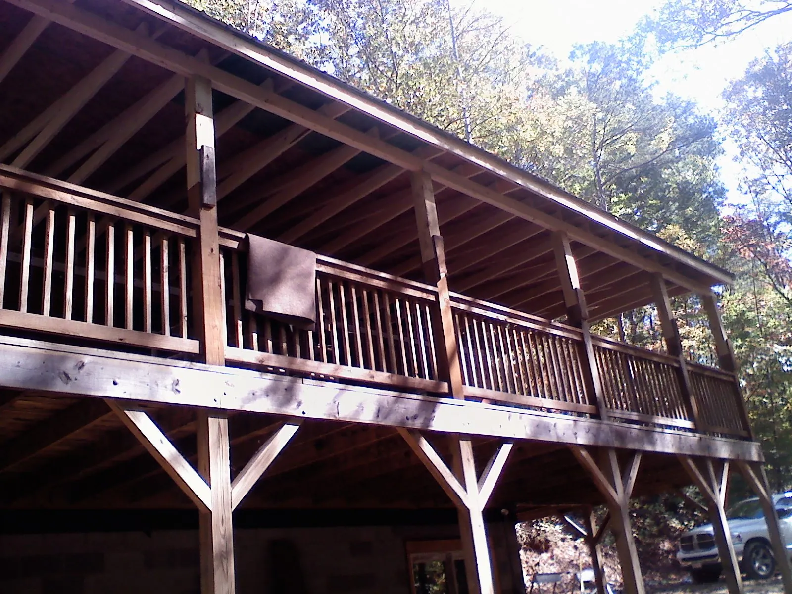 Timber framing under a new elevated porch and deck — Roof Leak Repair in Ebensburg by Roofing Brothers